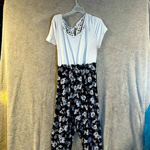 1X white & blk bell bottom jumpsuit with flowers